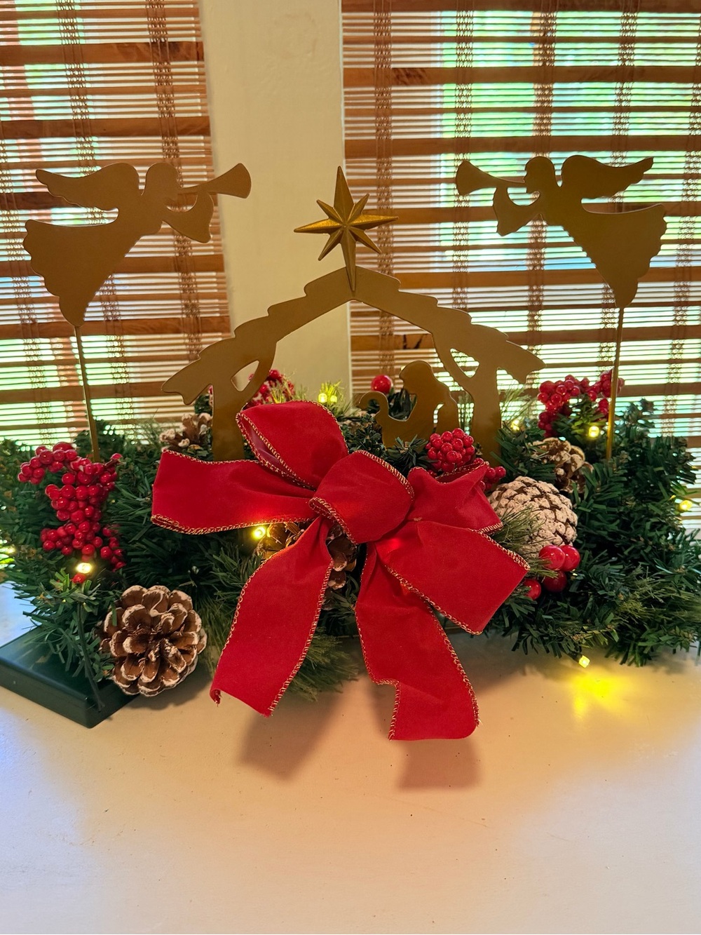 Gold Nativity Centerpiece with Red Velvet Bow